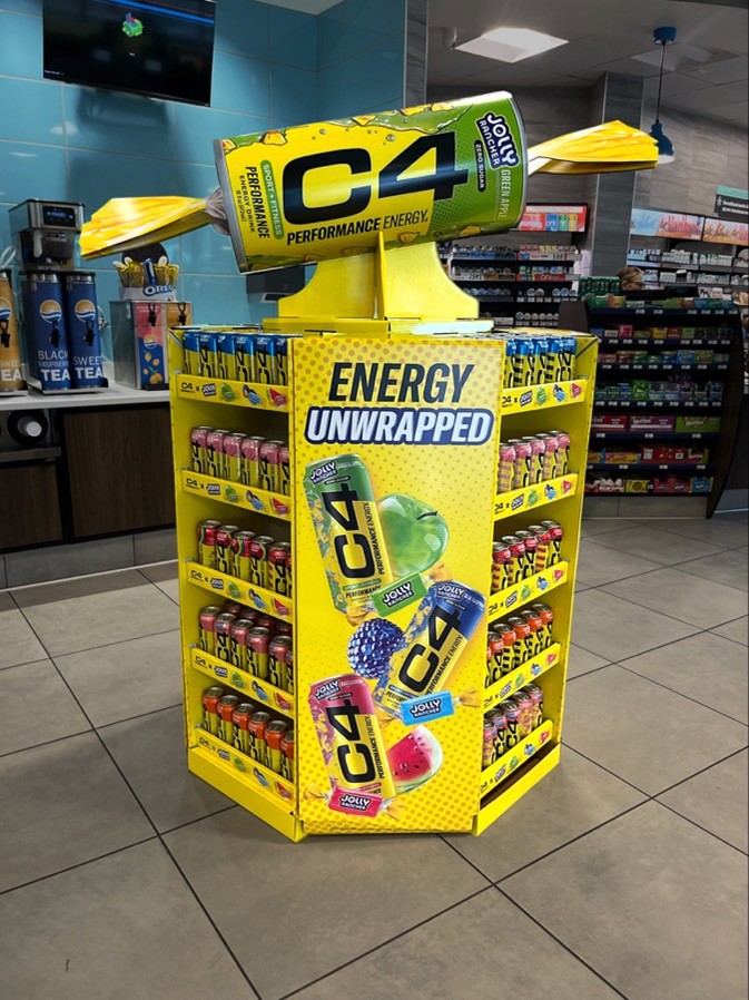 A retail POP display for C4 energy drink highlighting the importance of packaging graphic design and visual hierarchy.